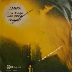 UNA DONNA, UNA STORIA / DOMINGA